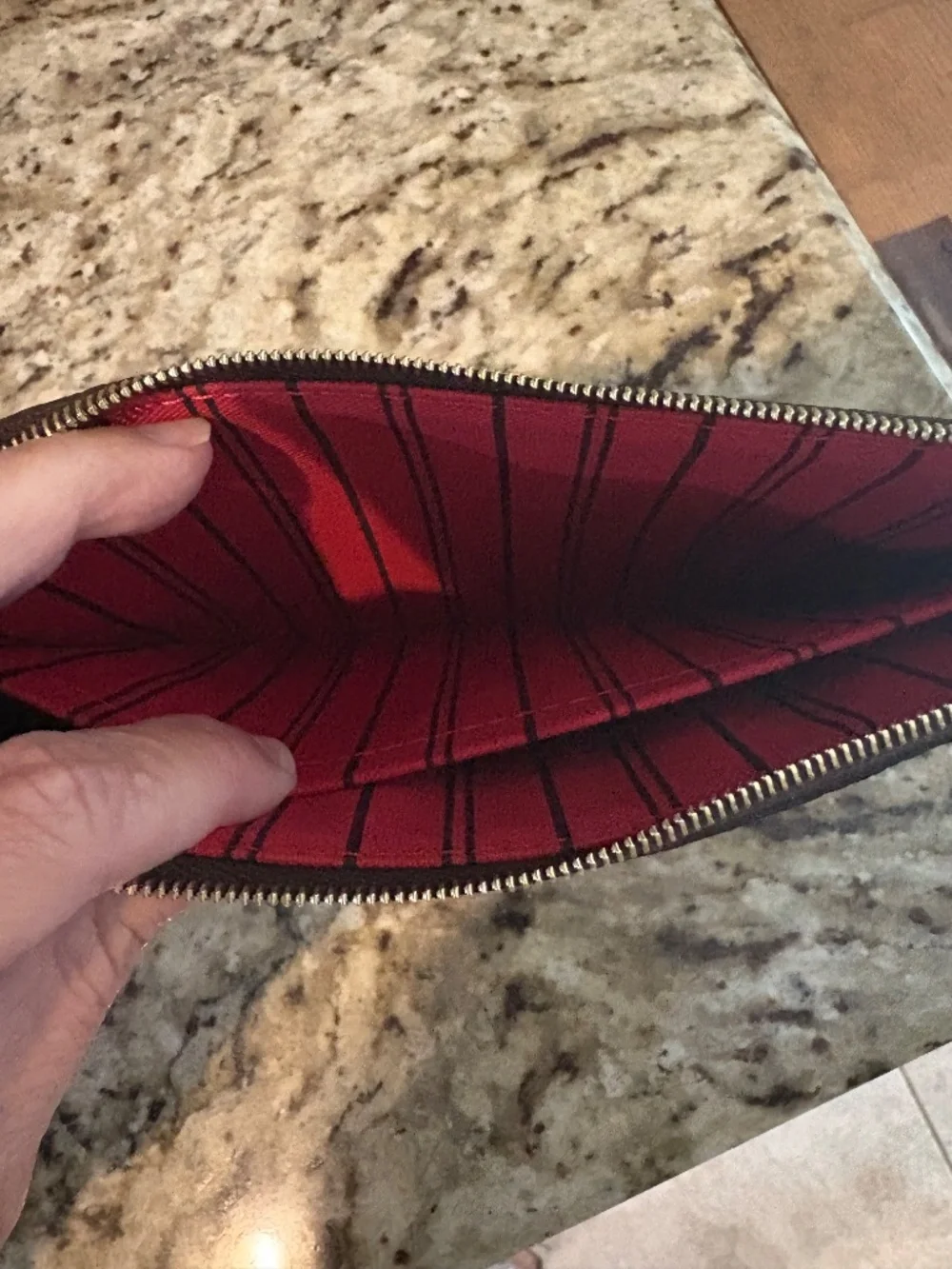 Louis Vuitton neverfull wristlet